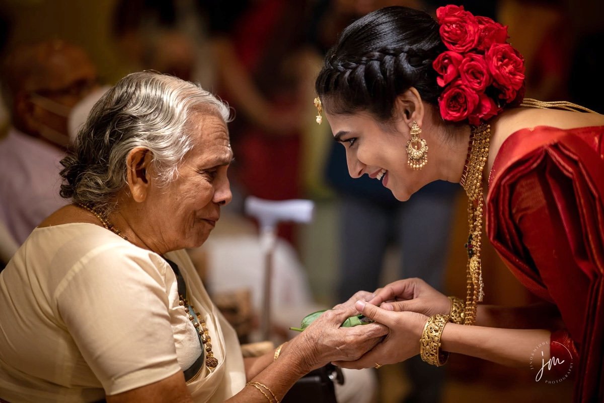 Elderly blessing between bride and grandmother